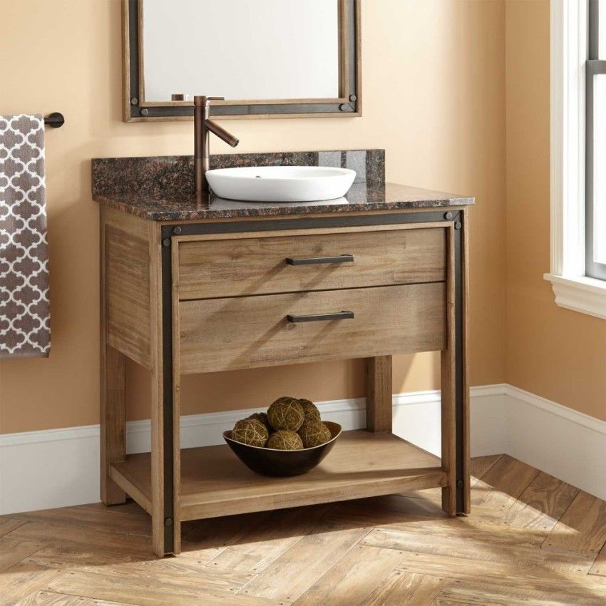 Lavabo avec une armoire dans la salle de bain: un élément pratique et fonctionnel de la pièce