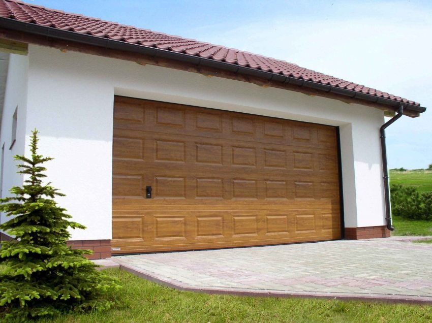 Portes sectionnelles du garage: la taille et le prix des conceptions pratiques